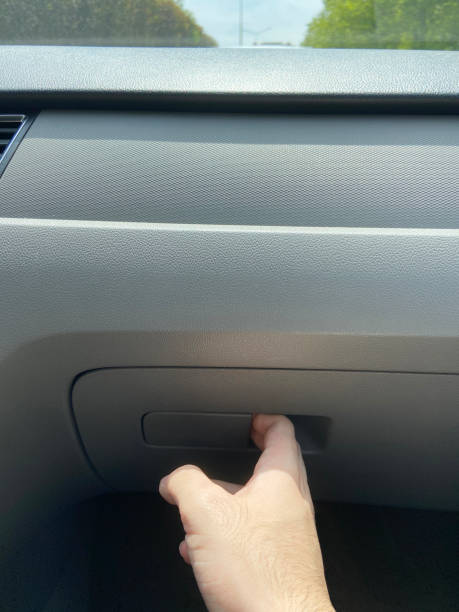 Hand opening the glove box, vehicle car interior Hand opening the glove box, vehicle car interior glove box stock pictures, royalty-free photos & images