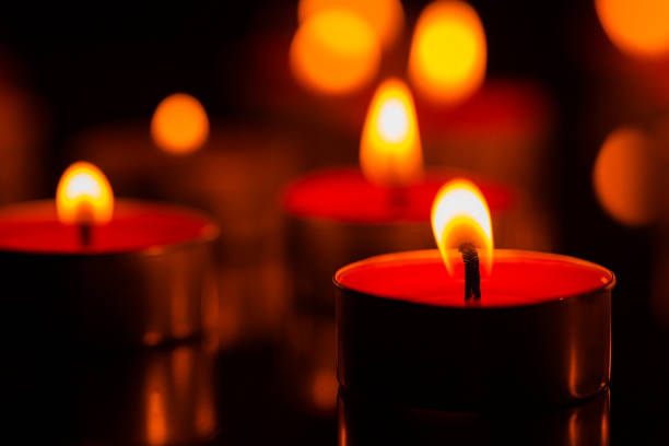 istock candle,Many candles burn with a shallow depth of field. 1396888564
