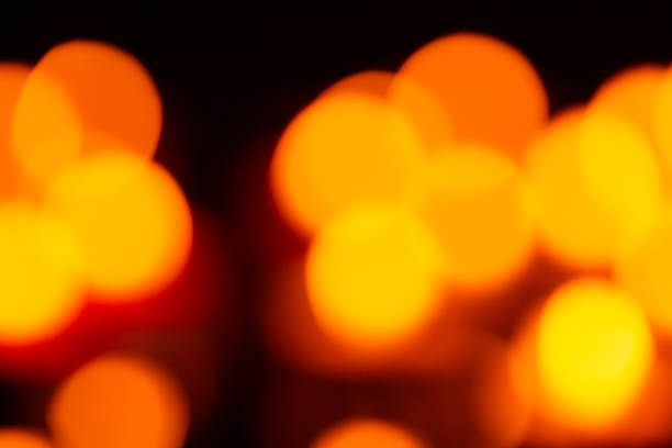istock Candlelight bokeh light texture,Many candles burn with a shallow depth of field 1396888574