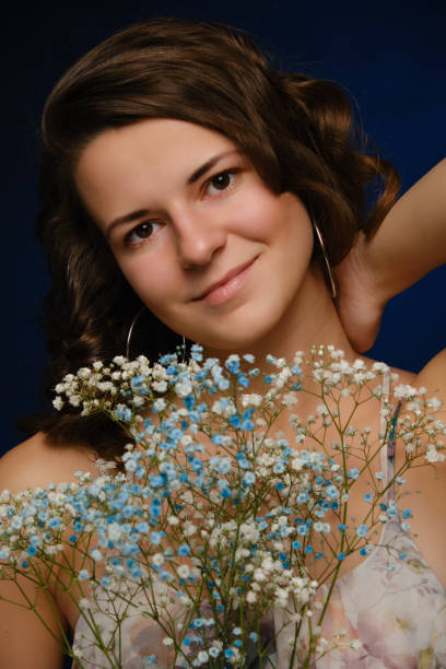 istock girl with flowers 1396890631