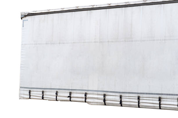 istock Semitrailer with white tarpaulin without inscriptions, isolated on white background with a clipping path. 1396890648