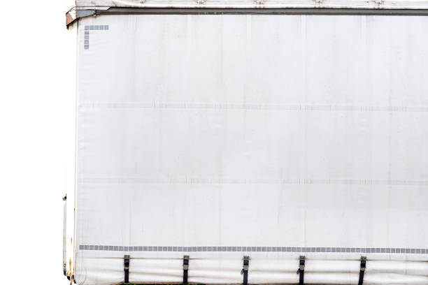 istock Semitrailer with white tarpaulin without inscriptions, isolated on white background with a clipping path. 1396890661
