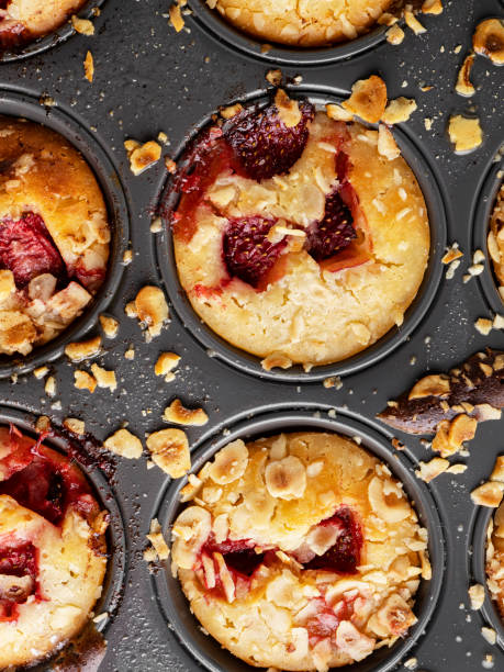 istock Strawberry Muffins, Baking Cupcakes, Muffins close-up in a baking dish, Cupcakes in Box 1396893078