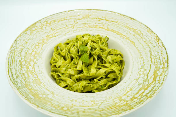 istock Fresh pasta dish made from spinach with cheese sauce 1396893817