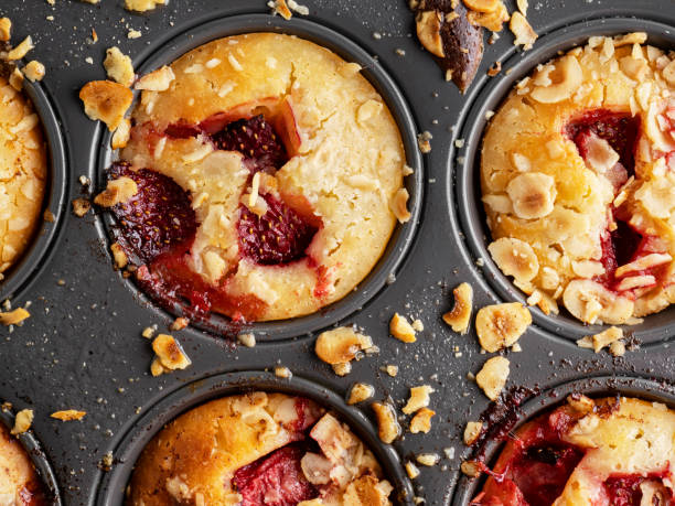 istock Strawberry Muffins, Baking Cupcakes, Muffins close-up in a baking dish, Cupcakes in Box 1396894235