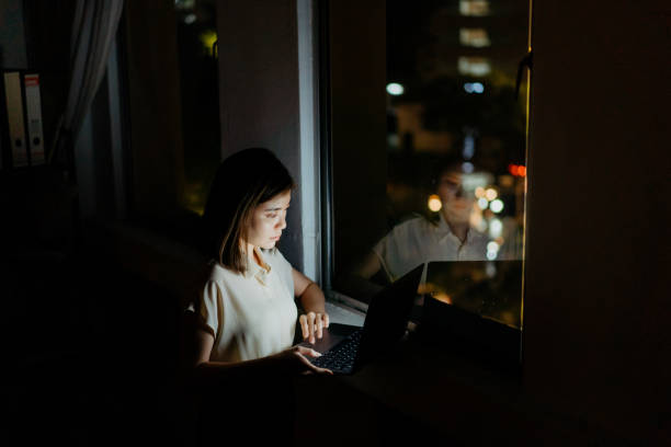 istock Businesswoman working late in office 1396895509
