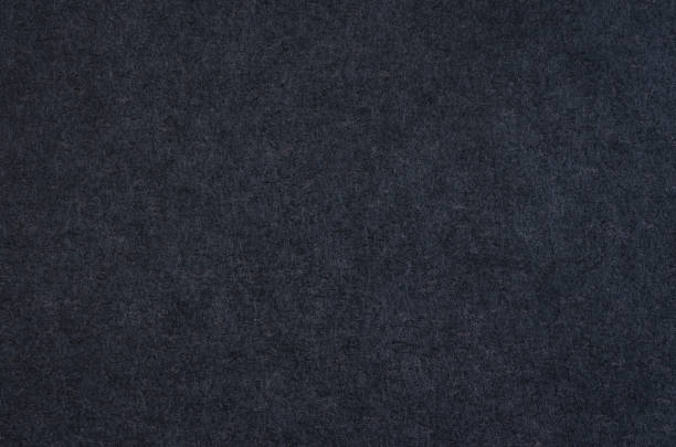 istock Dark blue paper texture. Book cover photograph. 1396899169