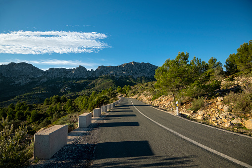Winding mountain road between Jalon village and Bernia mountain, Marina Alta, Costa Blanca, Alicante Province, Spain