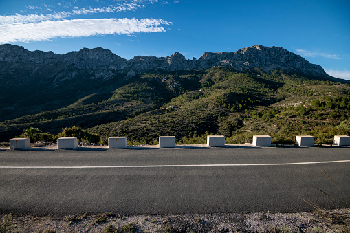 Winding mountain road between Jalon village and Bernia mountain, Marina Alta, Costa Blanca, Alicante Province, Spain