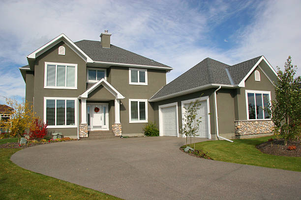 Long driveway leading up to an estate house