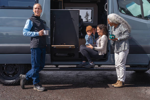 istock Happy multi-generation family on vacation in camper van 1396900735