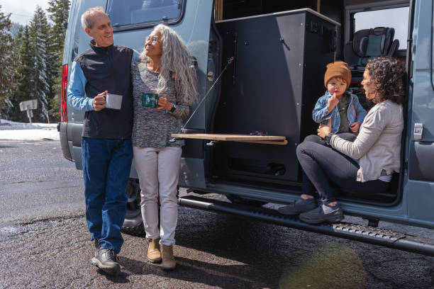 istock Happy multi-generation family on vacation in camper van 1396900736