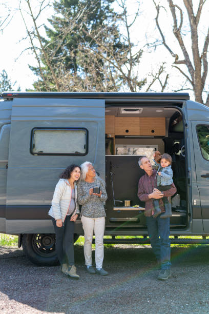 istock Multi-generation family on camping trip 1396900761