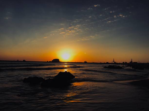istock Sunset over the ocean in Portugal 1396901095