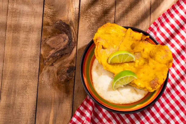 Photo of Fish torta with arepa - Colombian street food