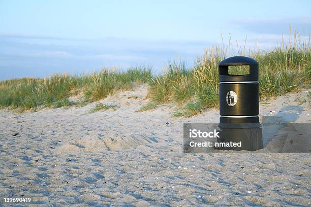 Bin On Beach Stock Photo - Download Image Now - Beach, Wastepaper Basket, Black Color