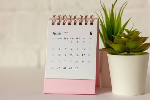 istock Desktop calendar for June 2022 on a light background. 1396905785