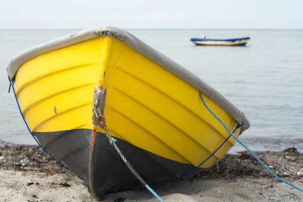 istock Yellow boat on beach 139690606
