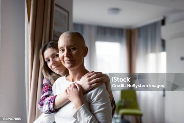 Woman With Cancer And Her Daughter Stock Photo - Download Image Now - Cancer - Illness, Patient, Oncology