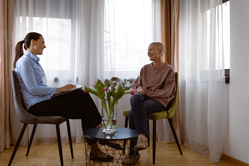 Woman with cancer  having psychotherapy at home