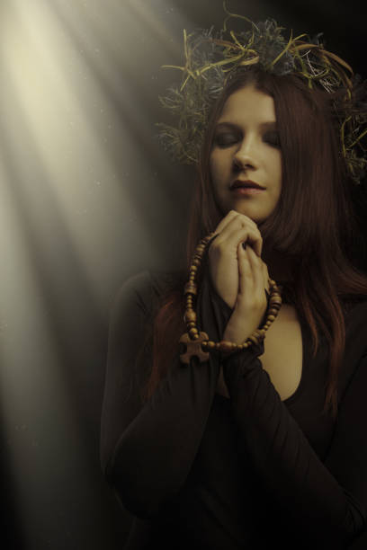 istock Praying woman 1396907525