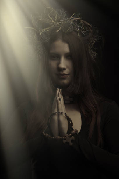 istock Praying woman 1396907634