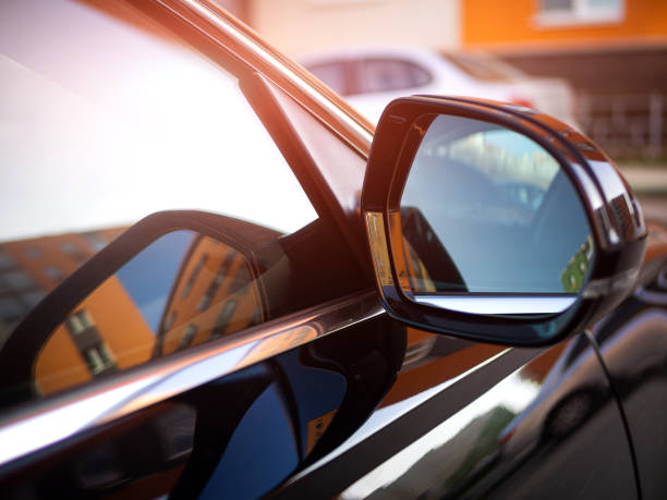 istock Anti-glare rearview mirror on a black car. 1396908719