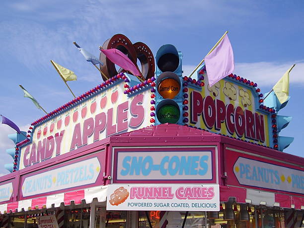 Advertising signs for food at a carnival or Boardwalk stock photo