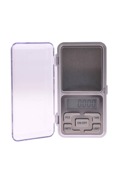 istock Electronic digital pocket scale weighing scale jewelers. 1396911255