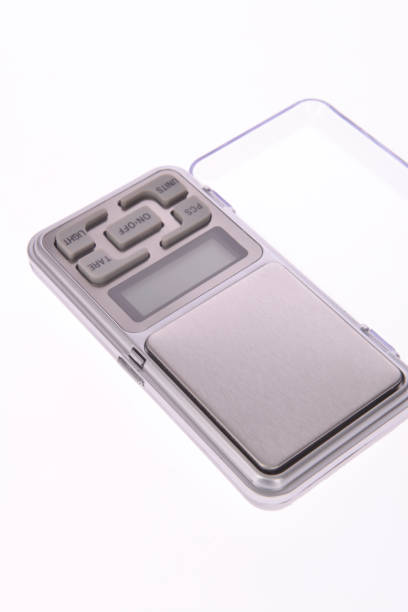 istock Electronic digital pocket scale weighing scale jewelers. 1396911256