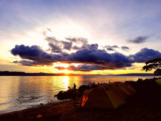 istock Beautiful sunrise on Lake Toba 1396911349