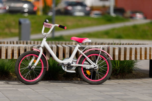 istock Modern children's bicycle in park on sunny day 1396912162