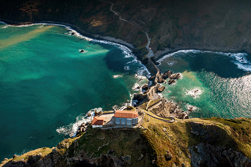 Aerial view of the island and the Gaztelugatxe temple. Northern Spain in winter. Drone view