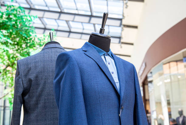 istock Male mannequins dressed in elegant men's suits 1396914523