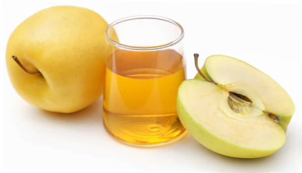 istock Apple cider vinegar with fresh fruit 1396914759