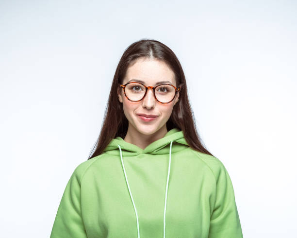 istock Smiling beautiful woman over white background 1396915733