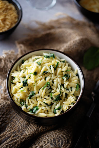 istock Creamy spinach cheesy orzo 1396916400