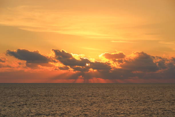 istock Sunset over Cruise Ship at Horizon 1396916464