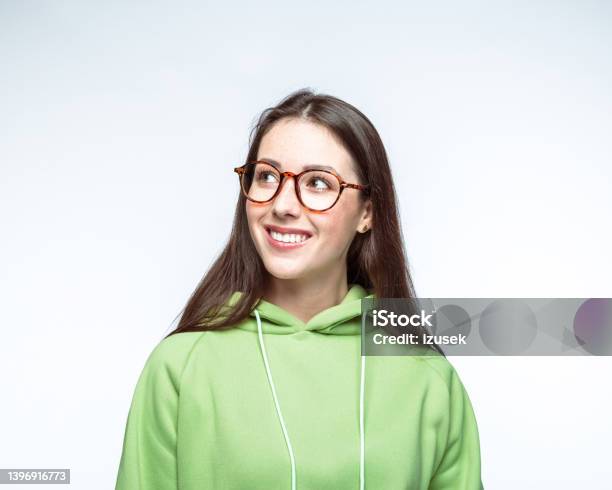 Woman Wearing Eyeglasses Looking Away Stock Photo - Download Image Now - Adult, Adults Only, Asian and Indian Ethnicities