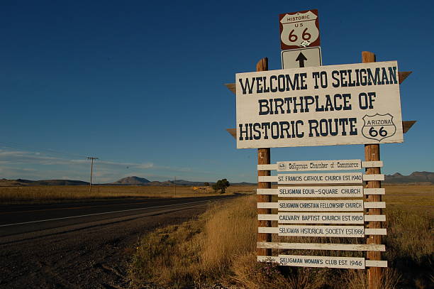 bem-vindo ao seligman - route 66 thoroughfare sign number 66 imagens e fotografias de stock