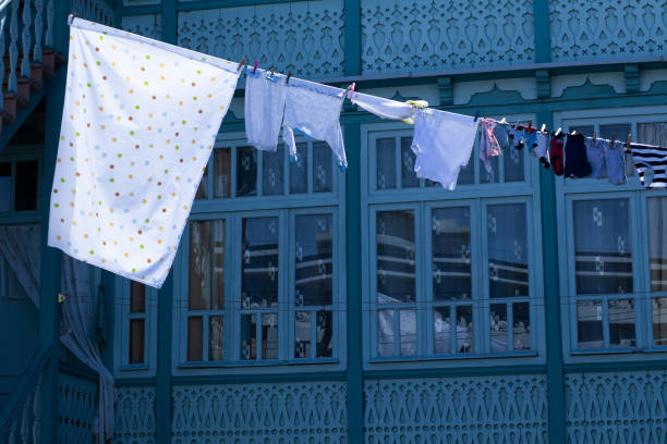 istock clothes drying on a line in daylight against the facade 1396919342