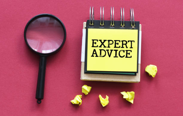istock EXPERT ADVICE word in the office notebook. 1396919674