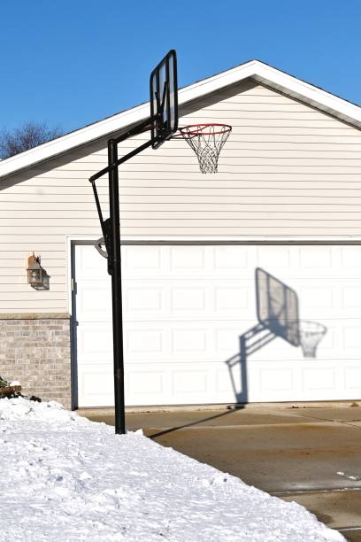 istock Basketball Hoop and Shadow 1396920670