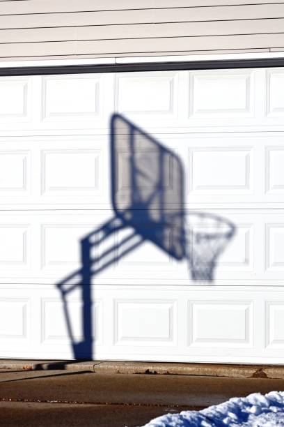 istock Shadow of Basketball Hoop 1396920679