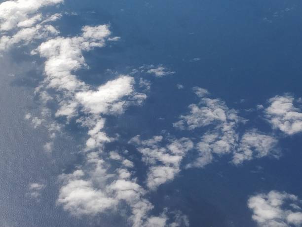 istock Flying over a sea of clouds 1396921765