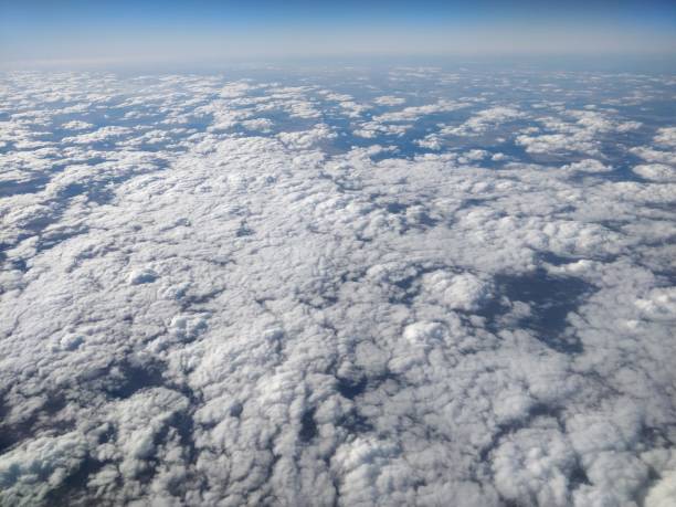 istock Flying over a sea of clouds 1396921797