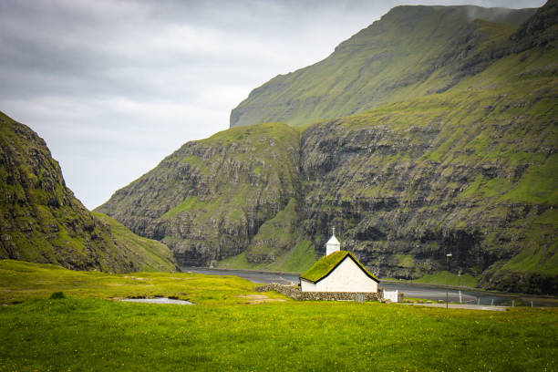 small church with grass roof on Faeroe Islands, valley, Streymoy Island