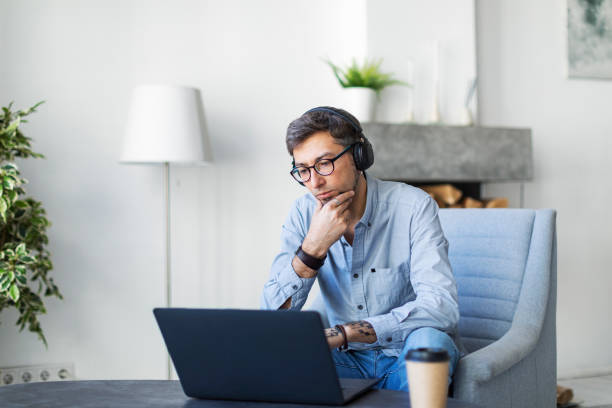 istock Young freelancer working from home with laptop having troubles 1396921920