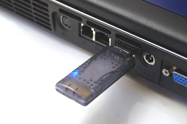 istock usb dongle connected to laptop 139692307