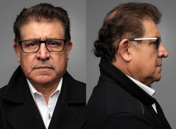 Hispanic senior man front and profile mugshots stock photo